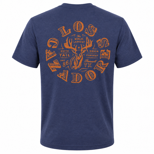 Back view of a Los Cazadores adult short-sleeve t-shirt displayed on an invisible ghost mannequin against a white background. The heather navy tee features a large vintage-inspired Los Cazadores graphic centered across the upper back with orange antlers, deer illustration, "The World's Largest White Tail Deer Contest," "Randall TX," and "Since 1986" text. The classic crew neck construction and heathered fabric texture are showcased in a clean ecommerce-style product image.