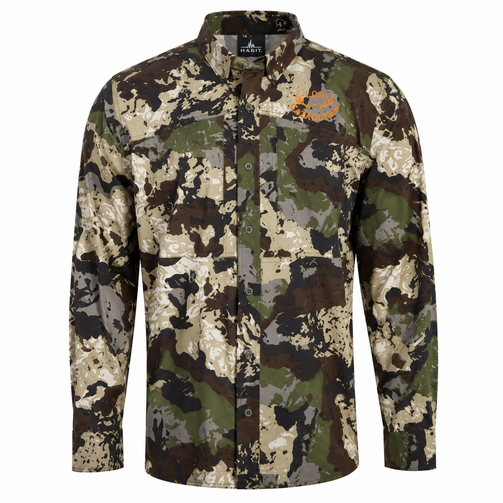Front view of a Los Cazadores men's camouflage long-sleeve button-up shirt displayed on an invisible ghost mannequin against a white background. The performance shirt features a multi-tone camouflage pattern in olive, brown, tan, and gray, with a button-down collar, full button-front closure, and technical outdoor construction. An orange Los Cazadores antler logo is embroidered on the wearer's left chest, creating a bold contrast against the camo pattern. Shown in a high-resolution ecommerce-style product image highlighting the garment's hunting-focused design, functionality, and premium outdoor apparel styling.
