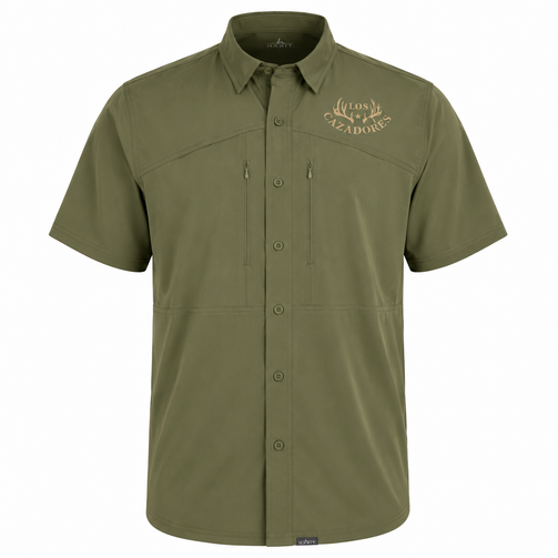 Front view of a Los Cazadores short-sleeve performance button-up shirt displayed on an invisible ghost mannequin against a pure white background. The olive-green technical fishing shirt features a structured collar, full button-front closure, dual vertical zippered chest pockets, and lightweight moisture-wicking fabric. A tan Los Cazadores antler logo is printed on the wearer's left chest. The shirt is presented in a high-resolution ecommerce-style product image highlighting its outdoor performance features, clean tailoring, and hunting lifestyle branding.