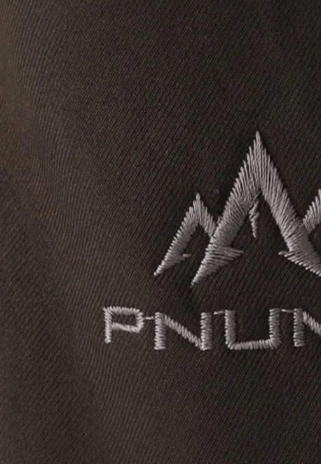 Close-up of the embroidered Pnuma logo on the Waypoint Glove