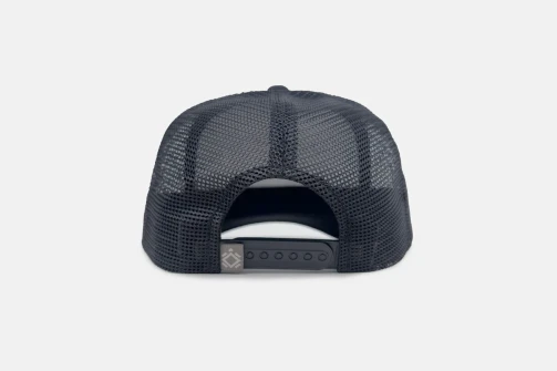 Back of black Turtlebox Bossman hat showing the vented rear panels and snapback closure