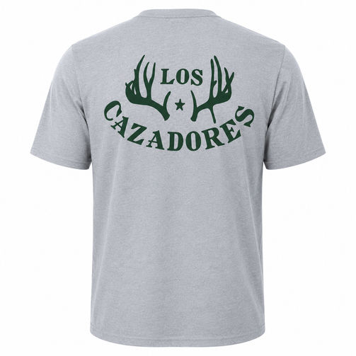 Back view of a Los Cazadores adult short-sleeve t-shirt displayed on an invisible ghost mannequin against a white background. The light heather gray crew neck tee features a large dark green Los Cazadores antler logo centered across the upper back, with stylized antlers, a star, and bold "LOS CAZADORES" lettering. The shirt has a classic relaxed fit, short sleeves, and a clean ecommerce-style presentation highlighting the full back graphic and garment construction.
