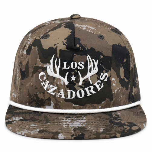 Front view of a Los Cazadores rope hat with white embroidered logo and white rope detail on Caza OV Camo pattern.