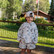 Child wearing the Burlebo youth vintage washed hoodie and matching shorts in mallard mayhem camo on a deck