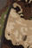 Close-up of the camo merino fabric and label on the Pnuma Gunnison Hoodie