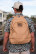 Back view of a man wearing the Burlebo backpack in tan cobblestone