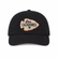 Front view of the Los Cazadores black cap with corrected cream arrowhead logo patch on a clean white background.