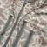 Close-up of the waterproof zippers and Burlebo logo on the Burlebo challenger jacket in classic deer camo