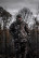 Hunter wearing the Pnuma Highpoint Pant and jacket in Caza OV camo in the woods