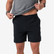 Man wearing the Burlebo men's everyday short in matte black with a retro duck camo pocket lining