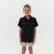 Boy wearing the Burlebo youth performance western shirt in black, front view