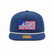Front view of the Los Cazadores blue rope cap with white rope, flag-style logo patch, and brim sticker on a clean white background.