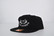 Los Cazadores Original Horns Logo Rope Cap Variant Color Black and White. Angled Front View