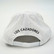 Back of White Dove Bash Cap with Los Cazadores embroidered.