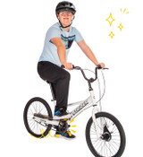 Rider on the 20x Sport bike, with yellow emphasis marks on the attached Pedal Kit