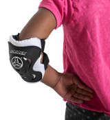 Close up of the elbow pad on a young kid