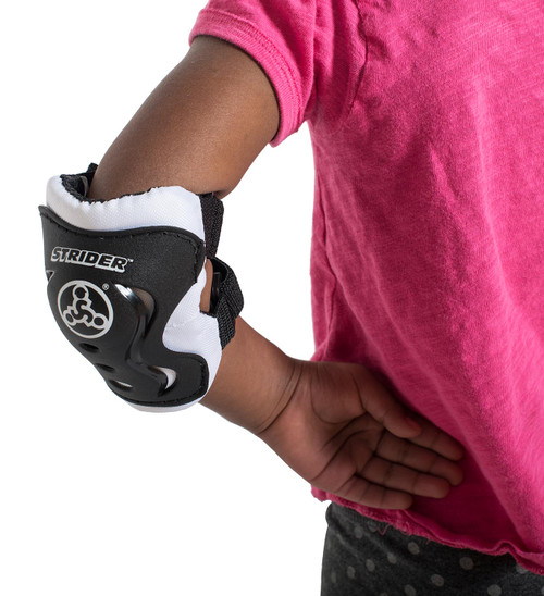 Close up of the elbow pad on a young kid
