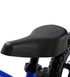 Up close view of the Strider Performance Seat assembled on a blue 12 Sport balance bike