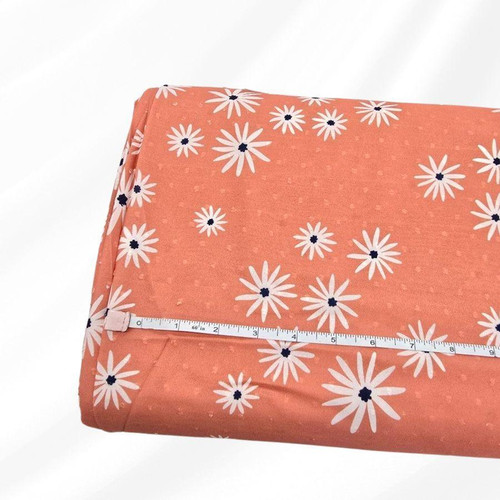 Coral Scattered Daisies Petite Poly Swiss Dot Fabric (sold by half yards)