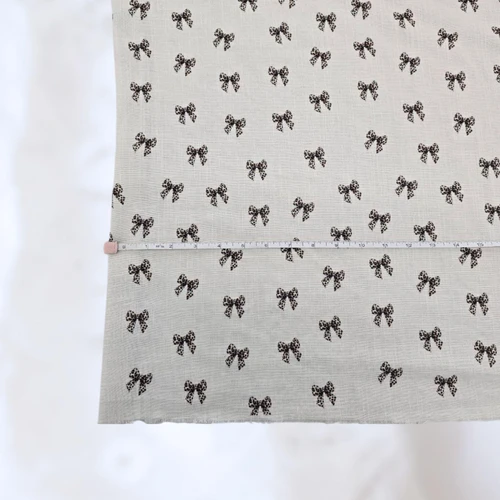 Leopard Bow Linen/Viscose Fabric (sold by half yards)