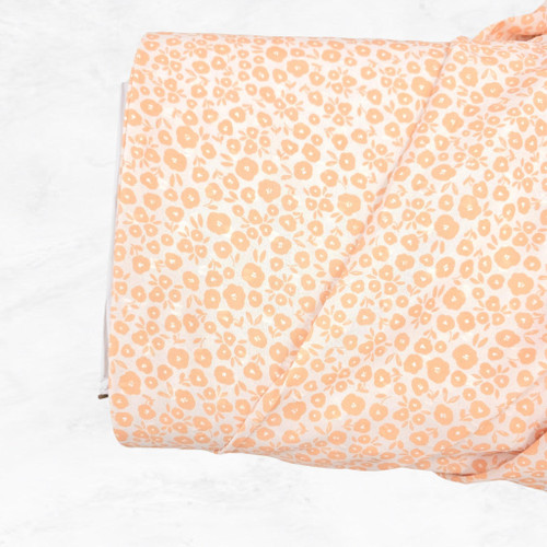 Creamsicle And White Ditsy Floral Poly Swiss Dot Fabric (sold by half yard)