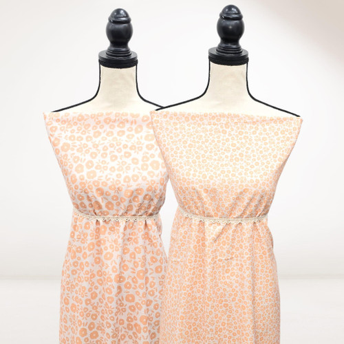 Creamsicle And White Ditsy Floral Poly Swiss Dot Fabric (sold by half yard)