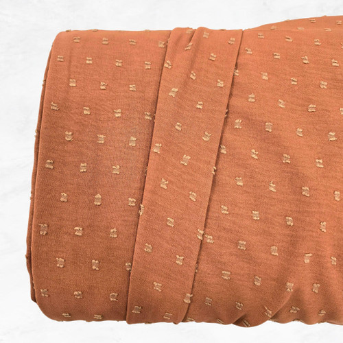 Dusty Rust Poly Swiss Dot Fabric