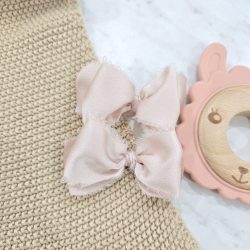 Muted Blush Frilly Bow Clip