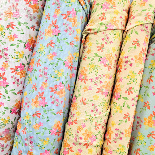 Beth's Exclusive Bold Summery Florals on Light Blue Liverpool Knit (sold by half yards)