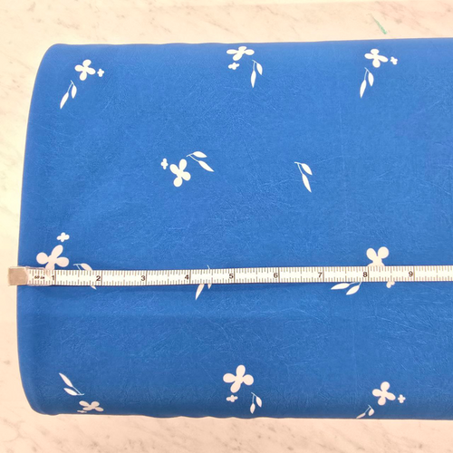 Beth's Exclusive Scattered Daisy on Deep Teal 4 Way Stretch Crinkle Poly (sold by half yards)