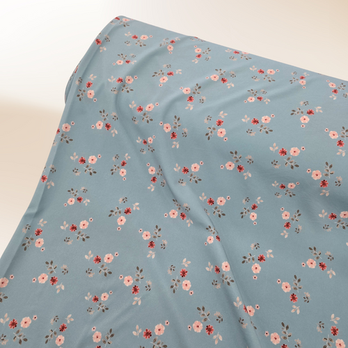 Beth's Exclusive Sunset Glow on Warm Sky Blue 4 Way Stretch Poly Crinkle (sold by half yards)