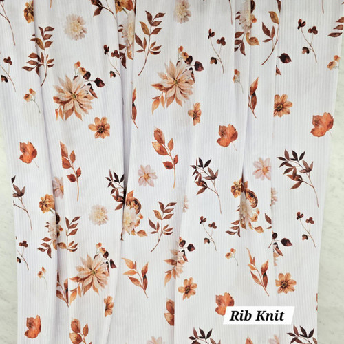 Beth's Exclusive Rust and Cream Florals on White Poly Rib Knit Fabric (sold by half yards)