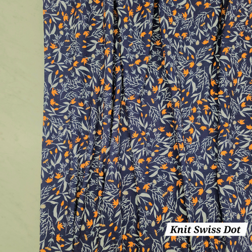 Beth's Exclusive Fall Leaves on Royal Blue Knit Swiss Dot Fabric (sold by half yards)
