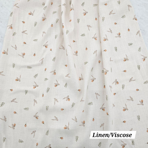 Small Orange Bouquet On Cream Linen Fabric (sold by half yard)