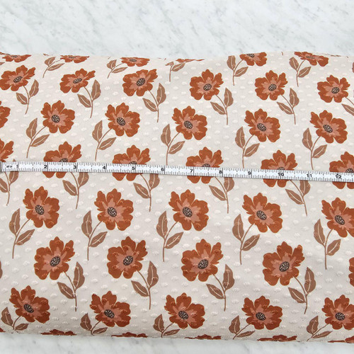 Burnt Orange Floral On Tan Swiss Dot Knit Fabric (sold by the half yard)