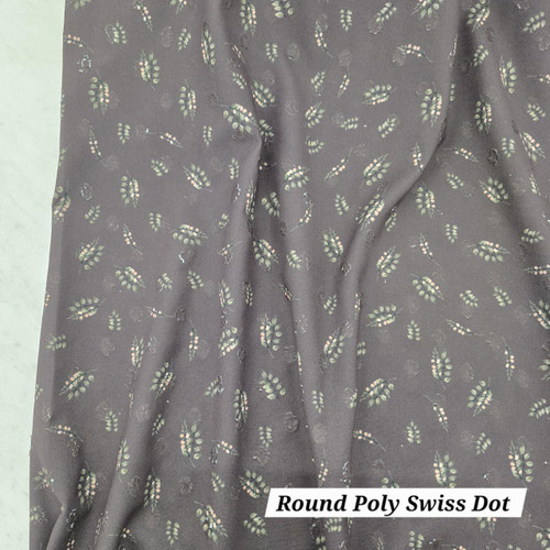 Beth's Exclusive Scattered Leaves on Charcoal Round Poly Swiss Dot Fabric (sold by half yards)