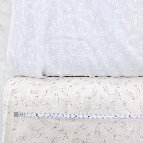 Grey Floating Feather On Creme Linen Fabric (sold by half yard)