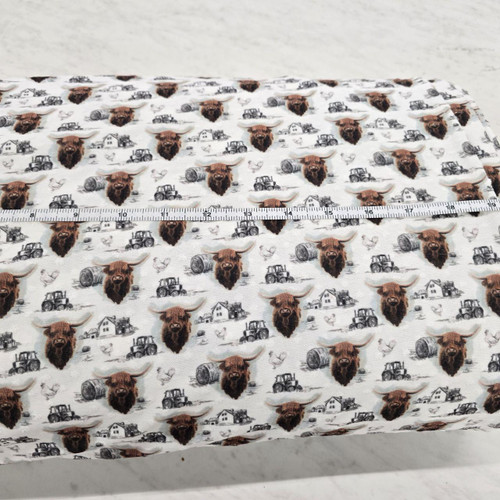 Beth's Exclusive Highland Cow Knit Swiss Dot Fabric (sold by half yards