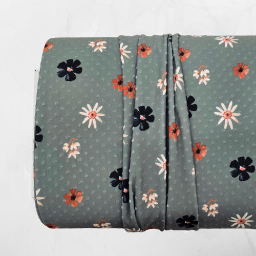 Black Cosmos Green Knit Swiss Dot Fabric (sold by half yards)