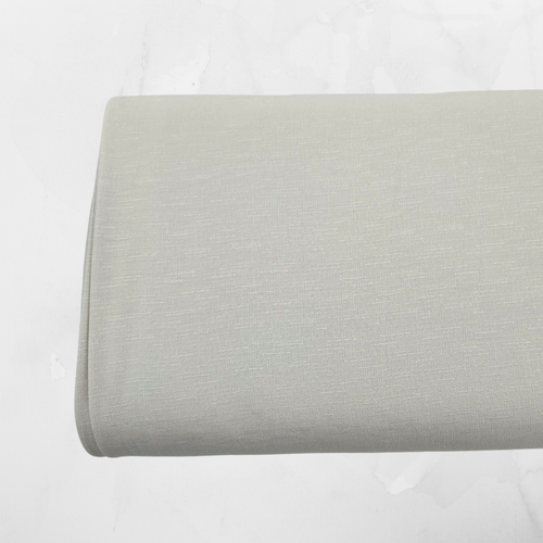 Off White 100% Poly with a Linen Look (sold by half yards)