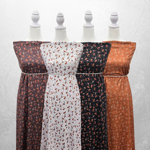 Ditsy Summer Blossoms Burnt Orange Rib Knit Fabric (sold by half yards)