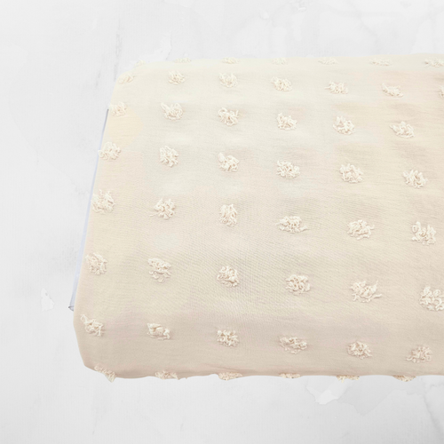 Ivory Penny Poly Swiss Dot Fabric (sold by half yards)