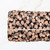 Toasted Peony on Black Poly Rib Knit Fabric (sold by half yards)