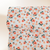 Beth's Exclusive Orange Blooms on White Speckled Poly Swiss Dot Circles (sold by half yards)