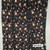 Beth's Exclusive Rust and Cream Florals On Black Poly Rib Knit Fabric (sold by half yards) Beth's Exclusive Rust and Cream Florals On Black Poly Rib Knit Fabric (sold by half yards)