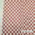 Rust Orange/White Checks Poly Rib Knit Fabric (sold by half yards) Rust Orange/White Checks Poly Rib Knit Fabric (sold by half yards)