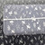Simple Grey Rose Design 4 Way Stretch Crinkle Poly Fabric (sold by half yard)