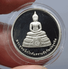 Phra Phuttha Nirokantarai amulet, Chaipattana Foundation, polished silver with sandblasted finish, small size (2 cm), 1996, with original box.