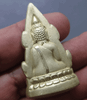A replica of the Phra Phuttha Chinnarat amulet, "Ten Thousand Yantra" series, free-standing, with a bell inside, made of silver, large size, 4.5 cm tall, from Wat Suthat, B.E. 2548 (2005). Comes with the original box.