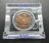 Polished copper commemorative coin of King Rama IX, 43rd anniversary of NIDA, with original case.
